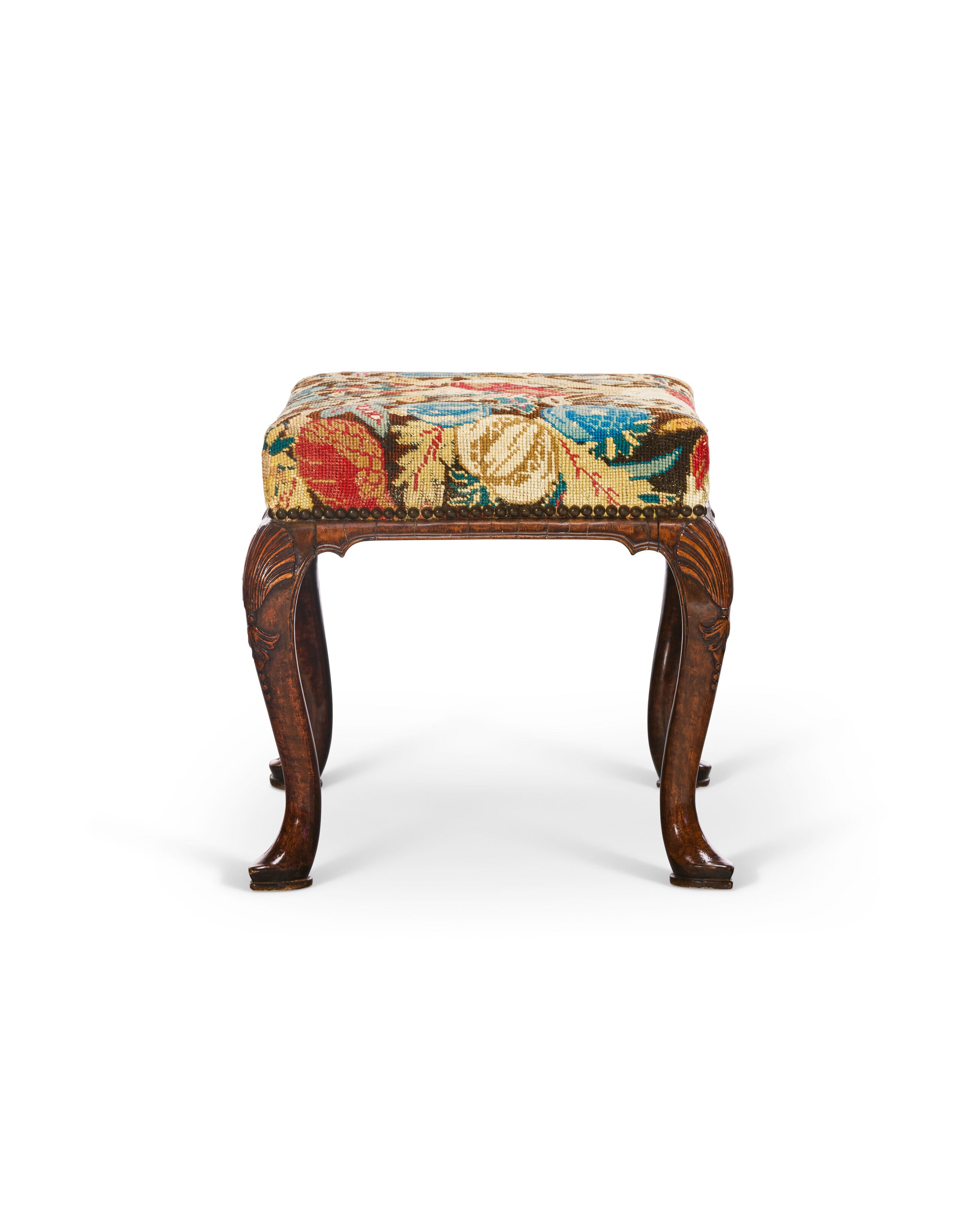 A GEORGE I WALNUT AND NEEDLEWORK STOOL